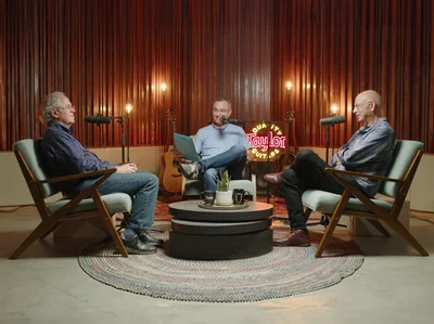 Bob Taylor and Kurt Listug sitting on chairs being interviews for the podcast